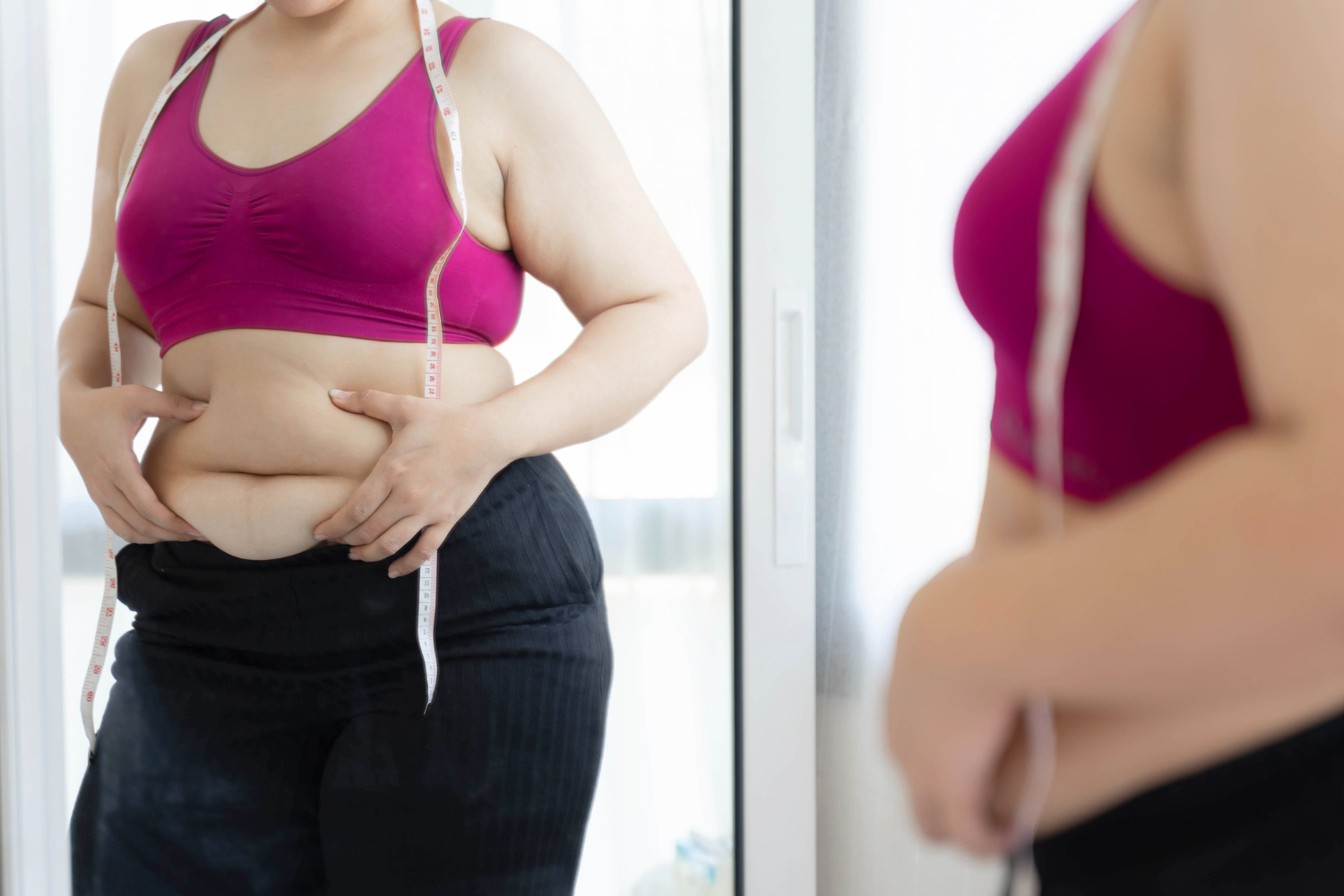 WHY WOMEN OFTEN HOLD EXTRA WEIGHT AROUND THEIR BELLIES AND WHAT YOU CAN DO ABOUT IT